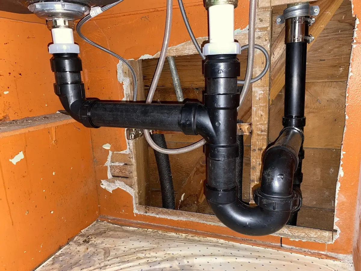 Professional Garbage Disposal Repair equipment and tools on the job in Loveland
